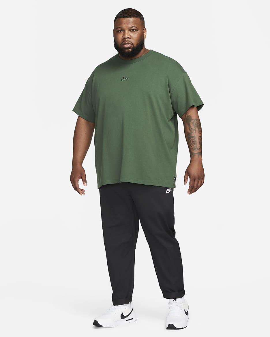 Nike woven tapered pants hotsell